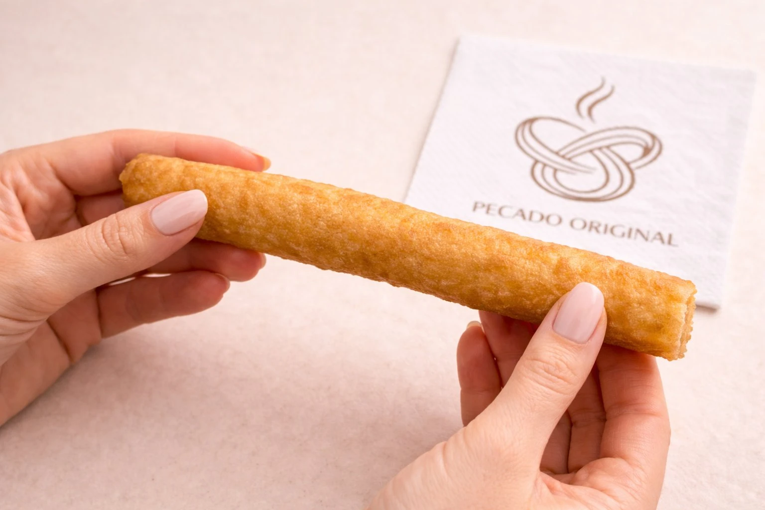 Servicio rápido de churros calientes en la Churrería Pecado Original